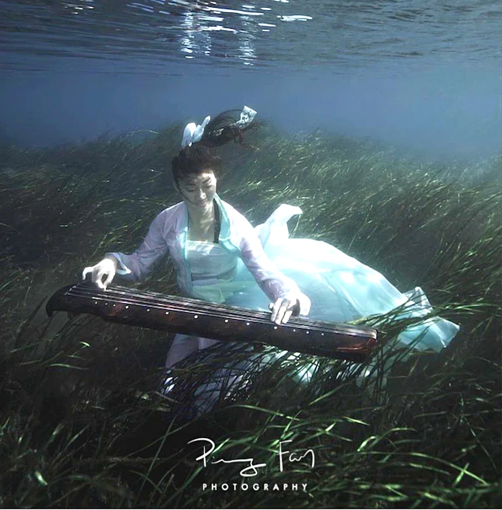 Jessea Lu under water photo
